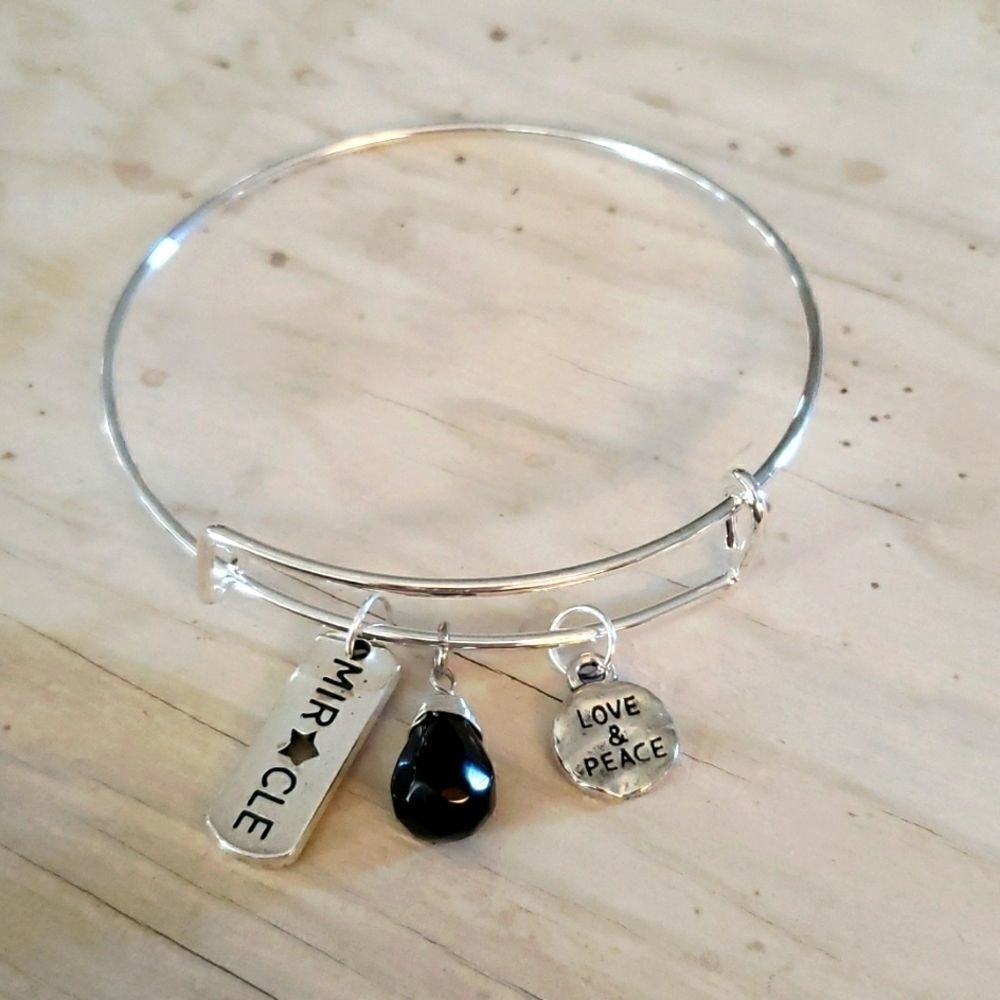 Bracelets by Sandra silver tone adjustable, miracle